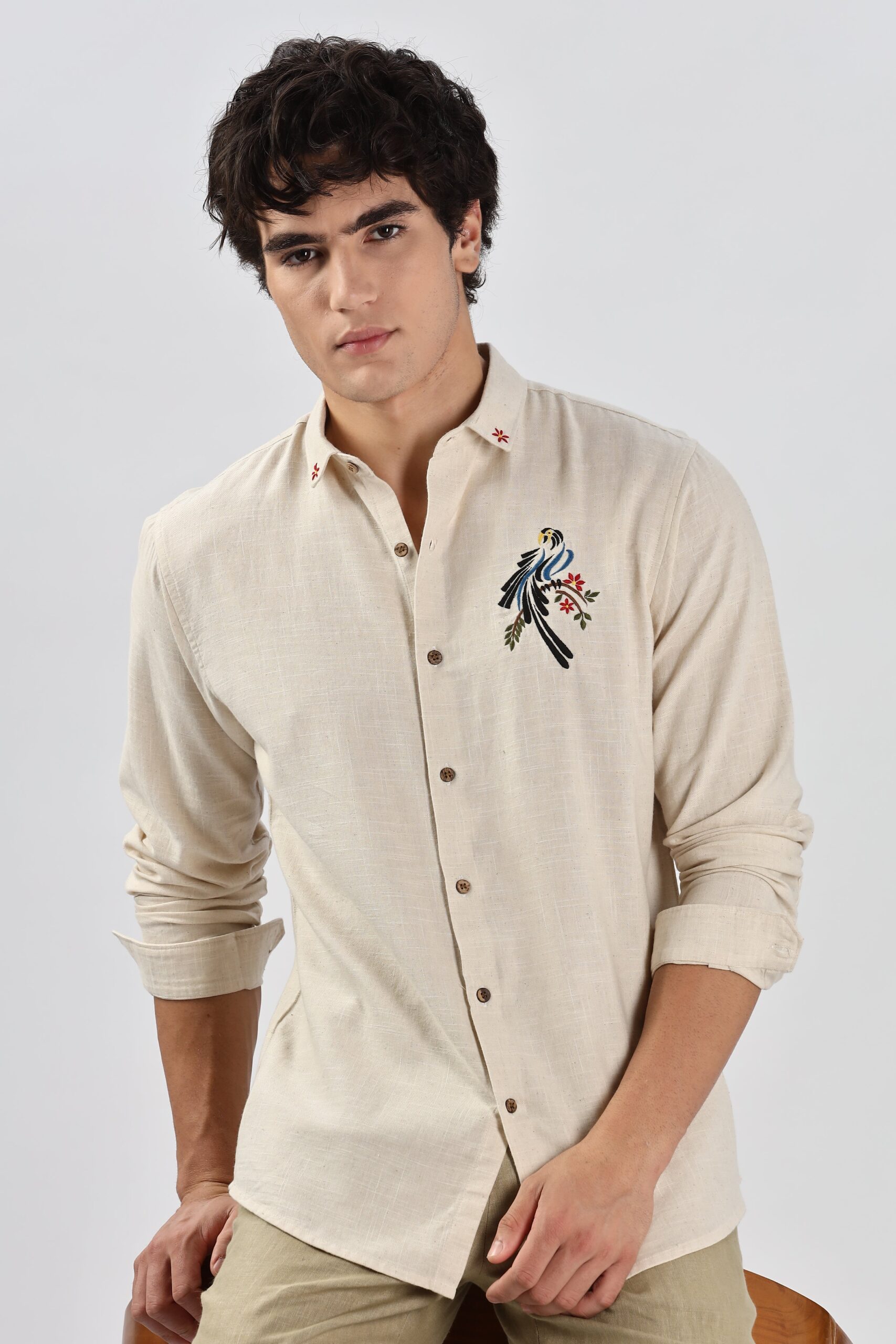 9_fea1fdde-bf2c-4b34-a307-51e7f750c29d-scaled-1.jpg Bambaiya Beige Parrot Motif Embroidered Statement Shirt - Image 1